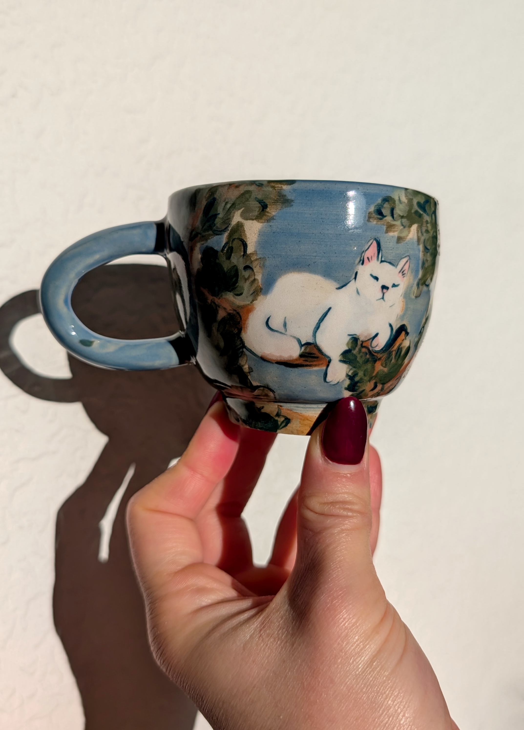 sleeping cat teacup one edited.png