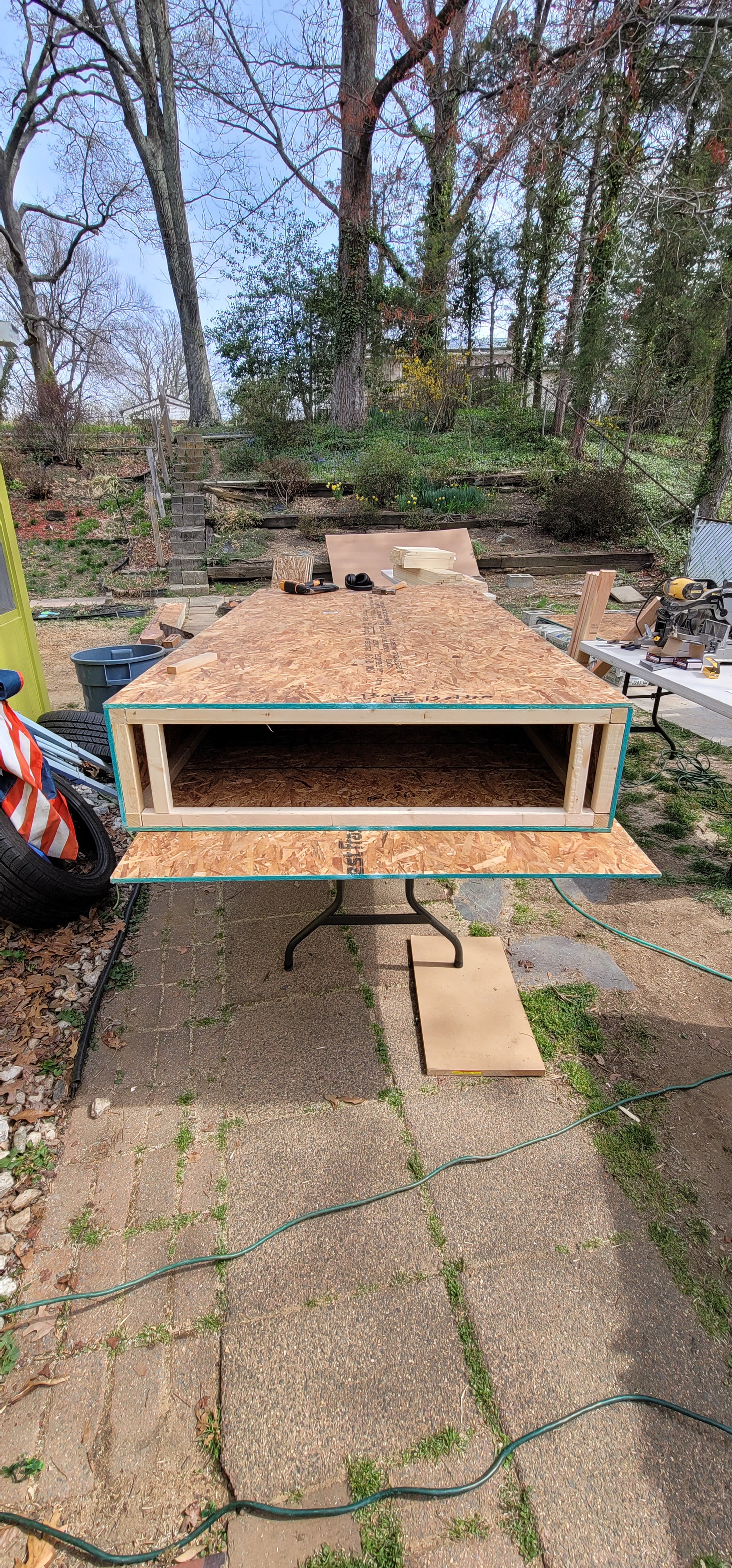 Fully enclosed frame of a custom faux boxwood hedge unit by GhostSquad_Design, built for Augusta After Dark during Masters Week. This unit features added structural reinforcement at the base to support casters and handle additional weight, ensuring s