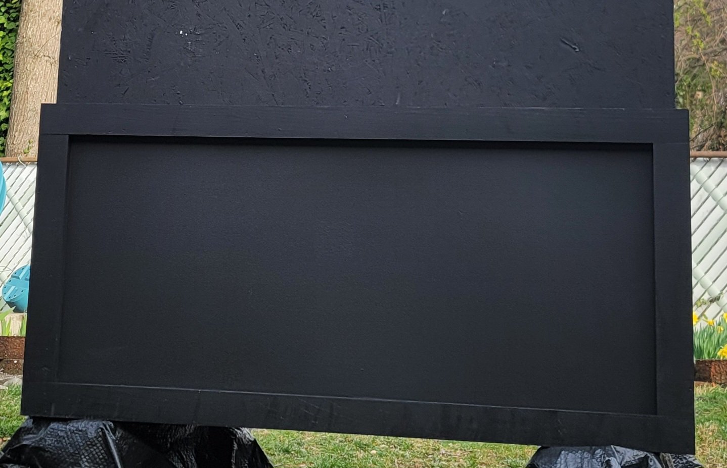 First completed paint finish on the bottom panel of a custom faux boxwood hedge unit by GhostSquad_Design, created for Augusta After Dark during Masters Week. The matte black finish adds a sleek, modern aesthetic while maintaining the durability and