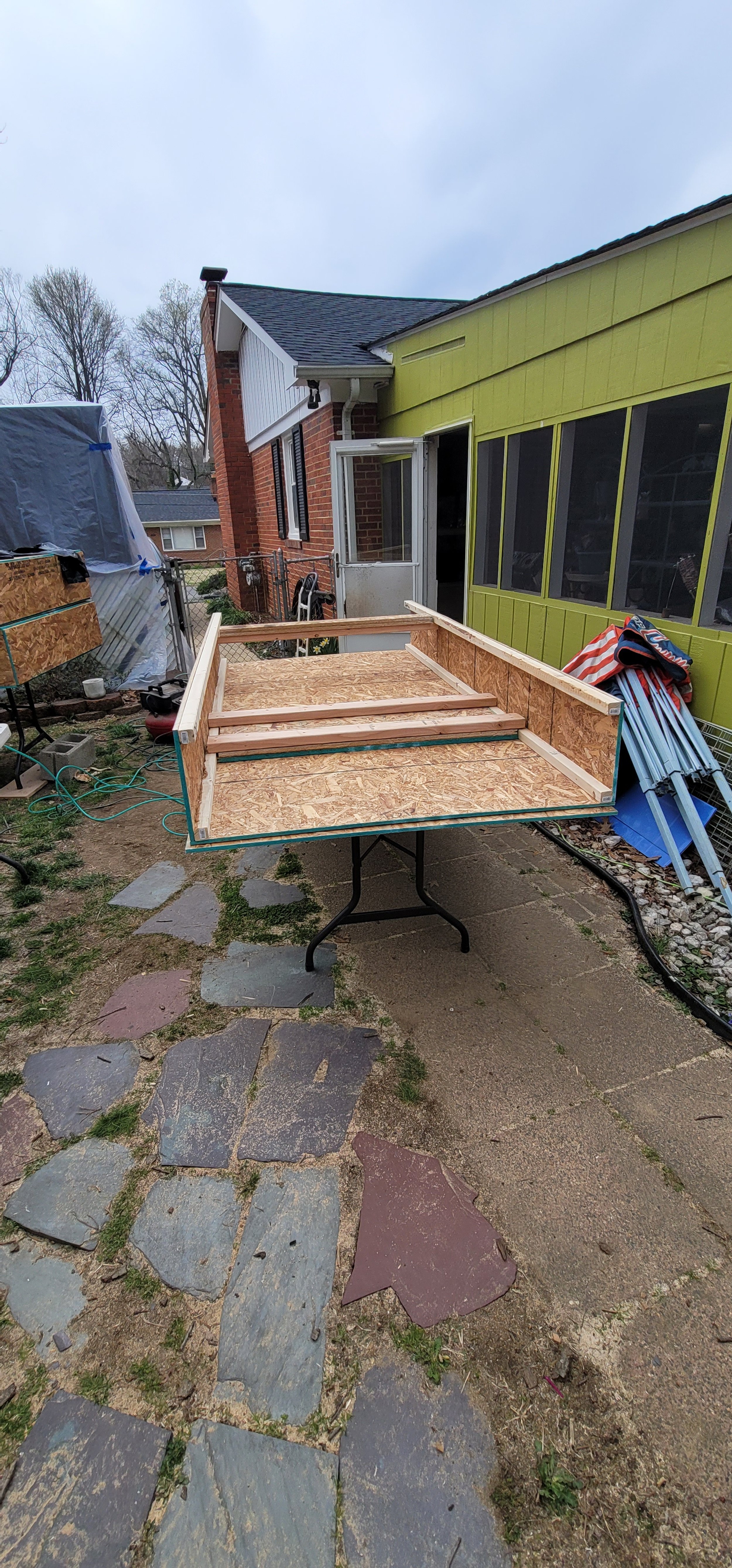 Framing in progress for a modular faux boxwood hedge panel by GhostSquad_Design, built for the Augusta After Dark event. This unit includes additional internal framing and reinforcement specifically added to support mounted TVs. The structure combine