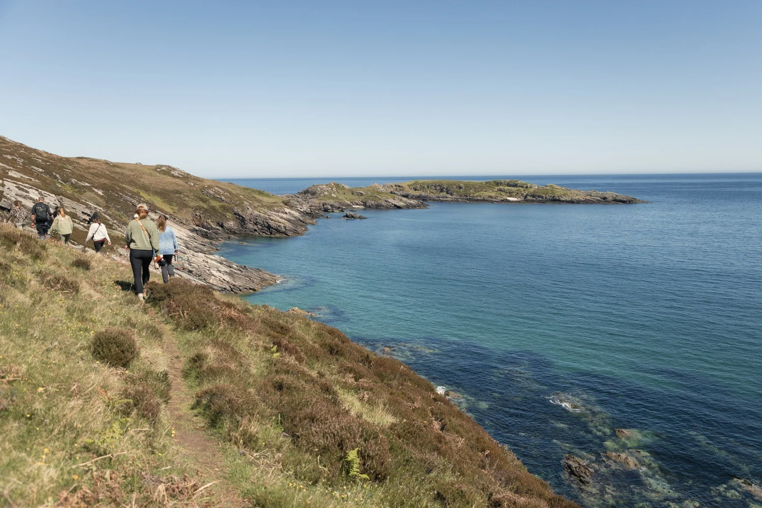 Guests walking the coast path near Kinloch Lodge, Sutherland, May 2025