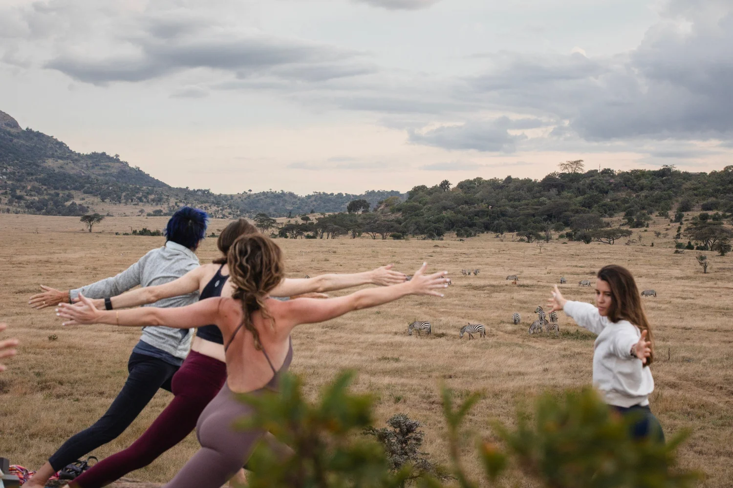Yoga out on the plains at Enasoit Camp, Laikipia, October 2024