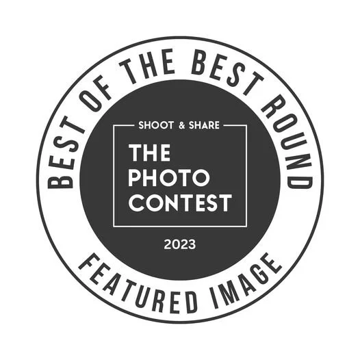 Circular badge with text: 'Best of the Best Round,' 'Shoot & Share,' 'The Photo Contest,' and '2023.'