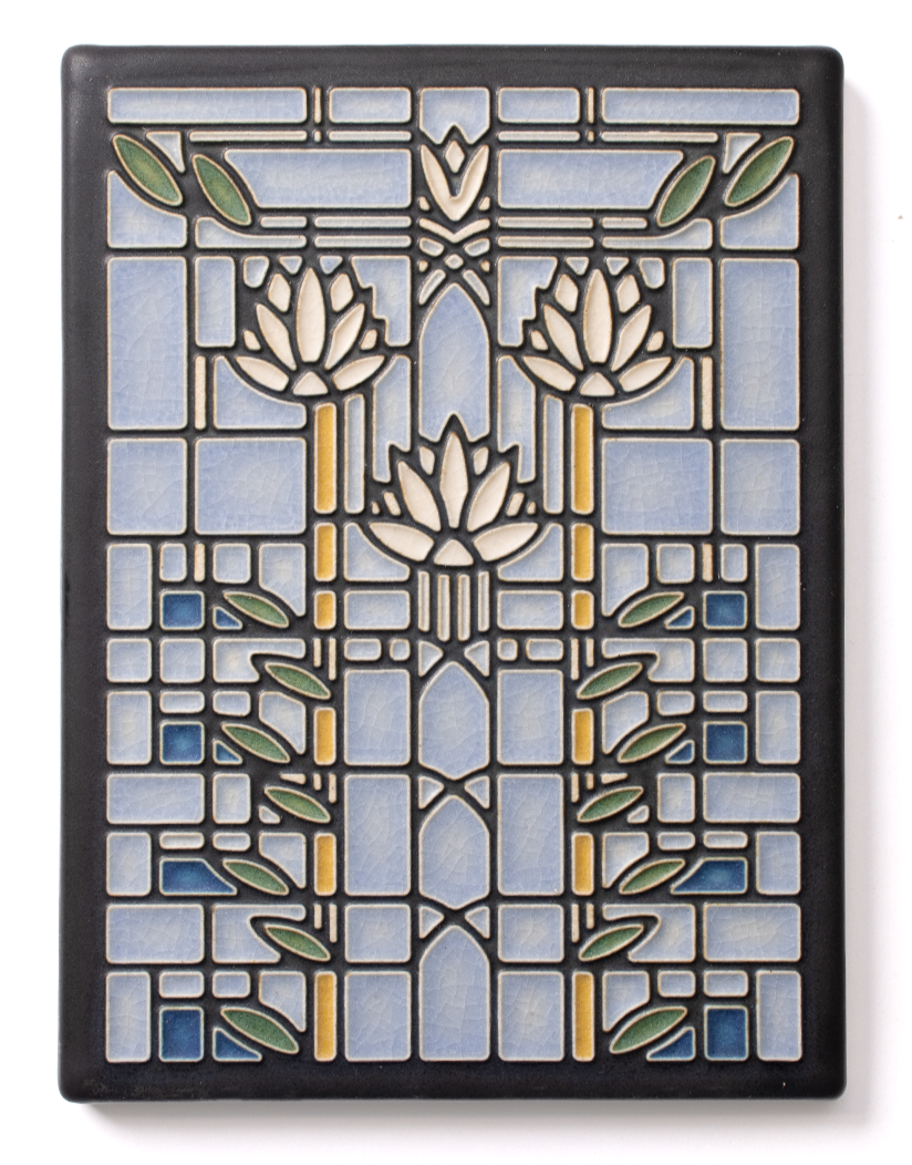Decorative stained glass window panel with floral and geometric patterns in shades of blue, white, yellow, green, and black.