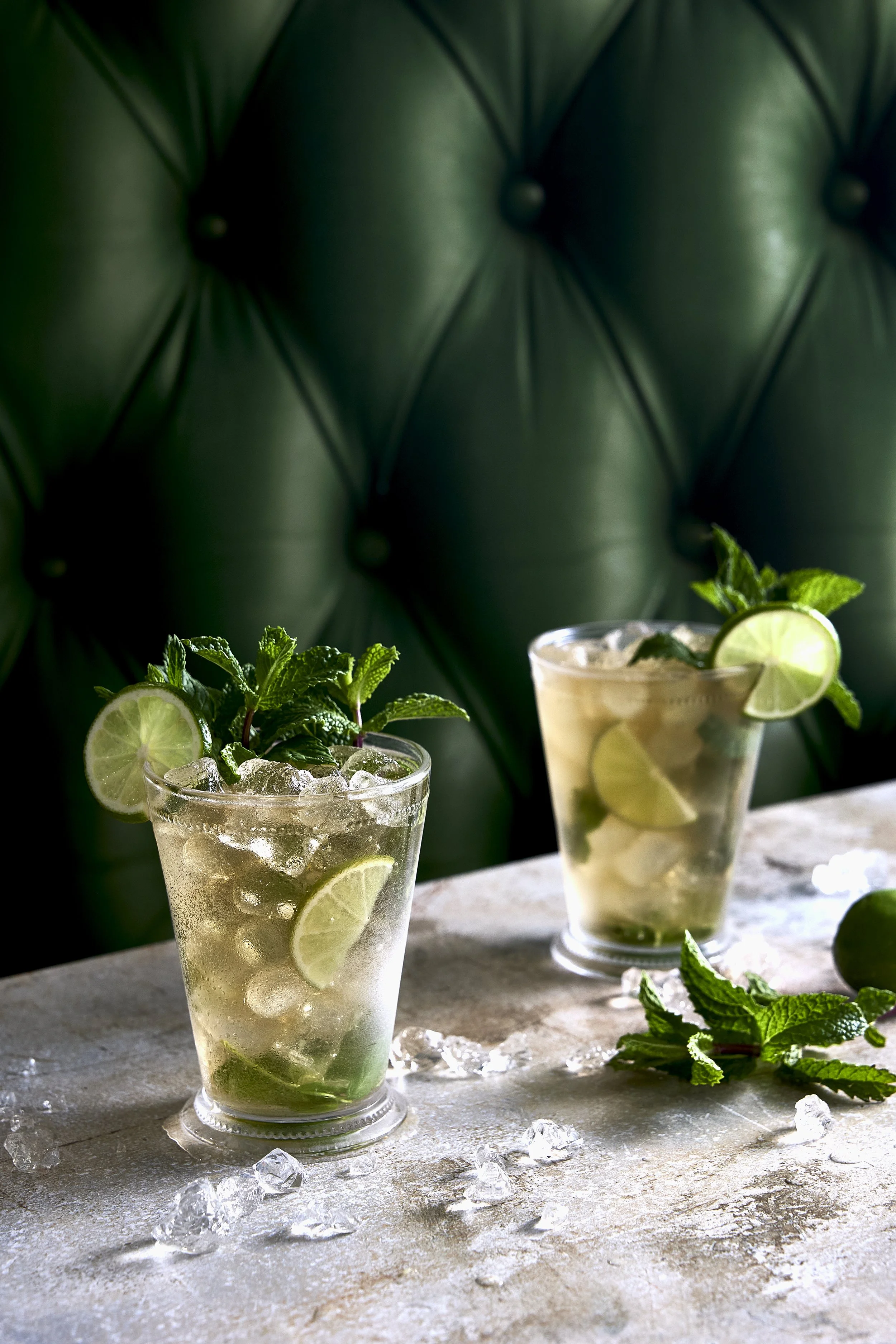 Drink photography featuring a glass of mint julep and fresh mint