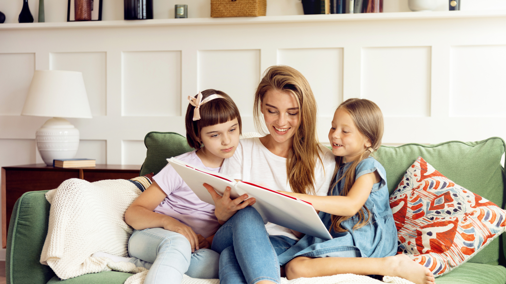 nanny with two girls reading