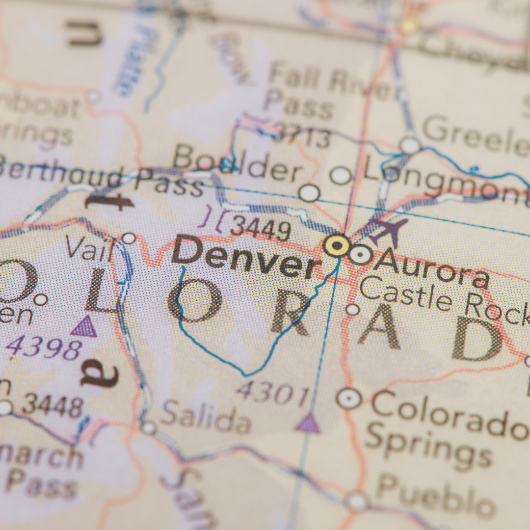 Close-up of a map showing Denver, Colorado, with nearby cities and highways.