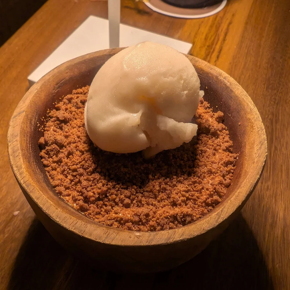 Cacao - chocolate mousse, passion fruit gelée pistachio, almond, caramelized nibs soursop and cacao mucilage ice cream