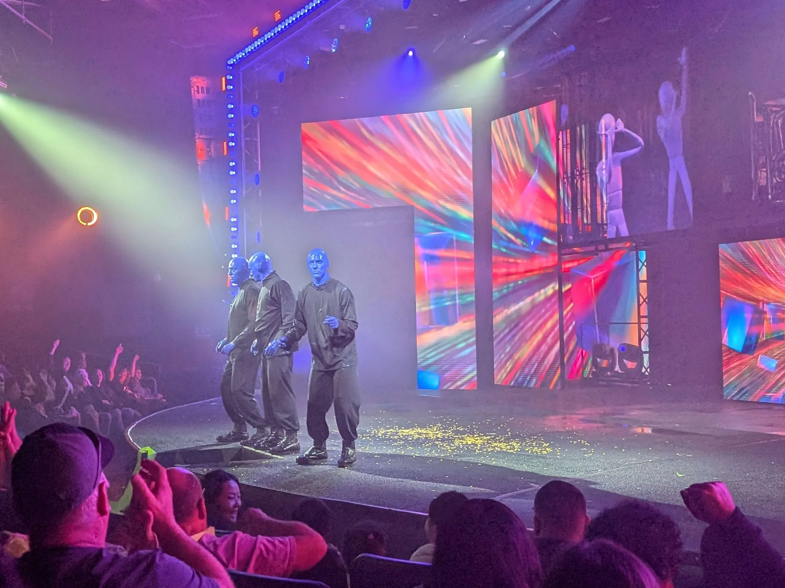 Blue Man Group performing their colorful music and comedy show in Las Vegas