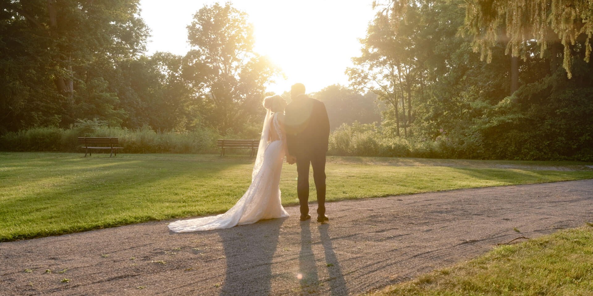 bride and groom walking away