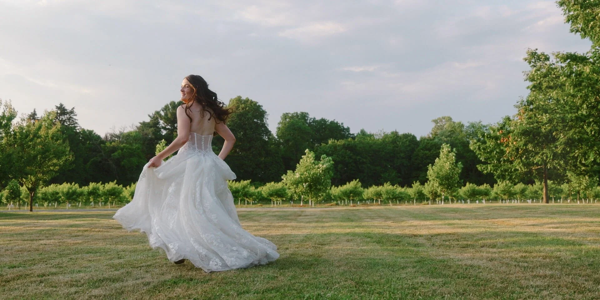 Bride running in wedding dress