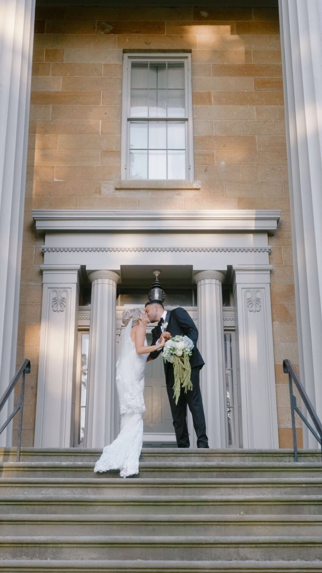 bride and groom kissing