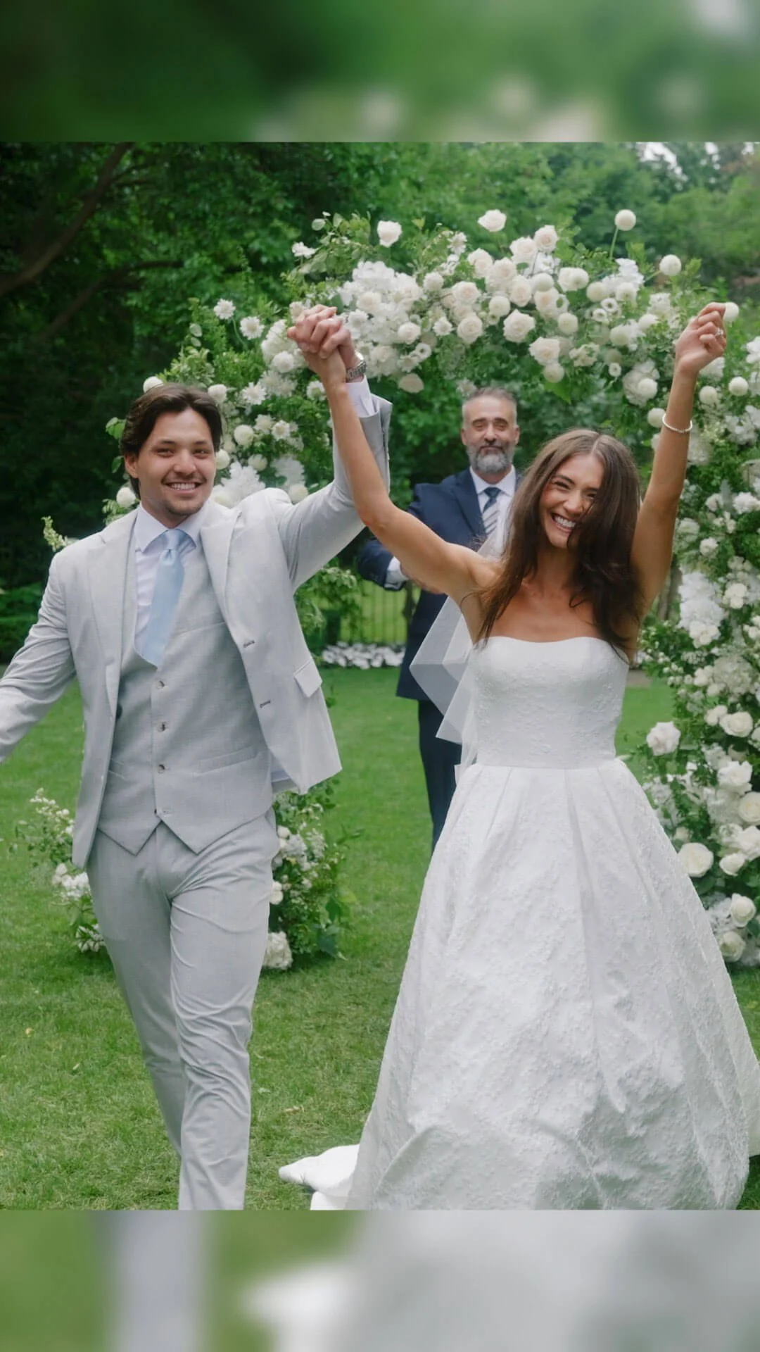 bride and groom celebrating after ceremony