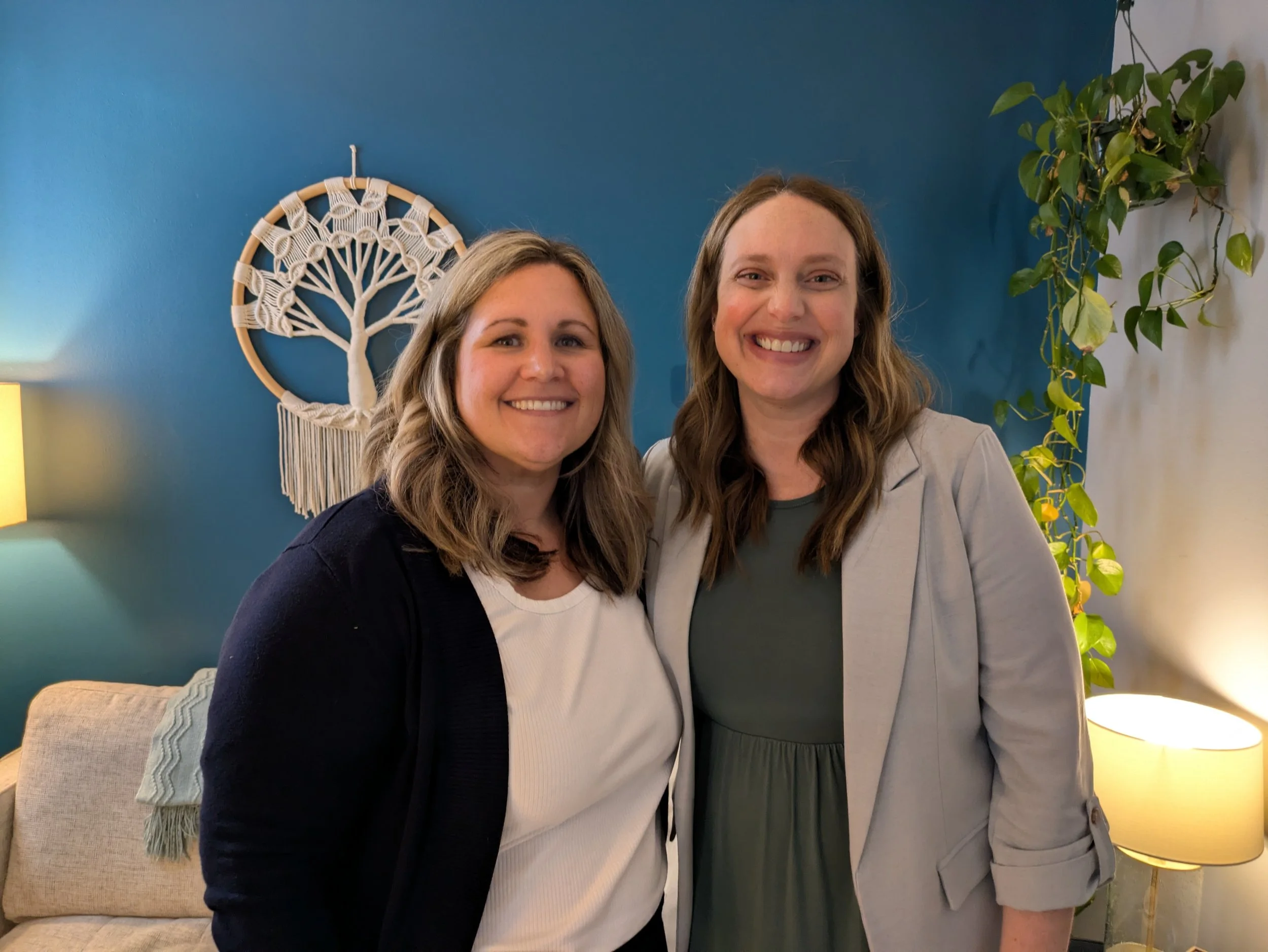 Katie and Stacey standing together