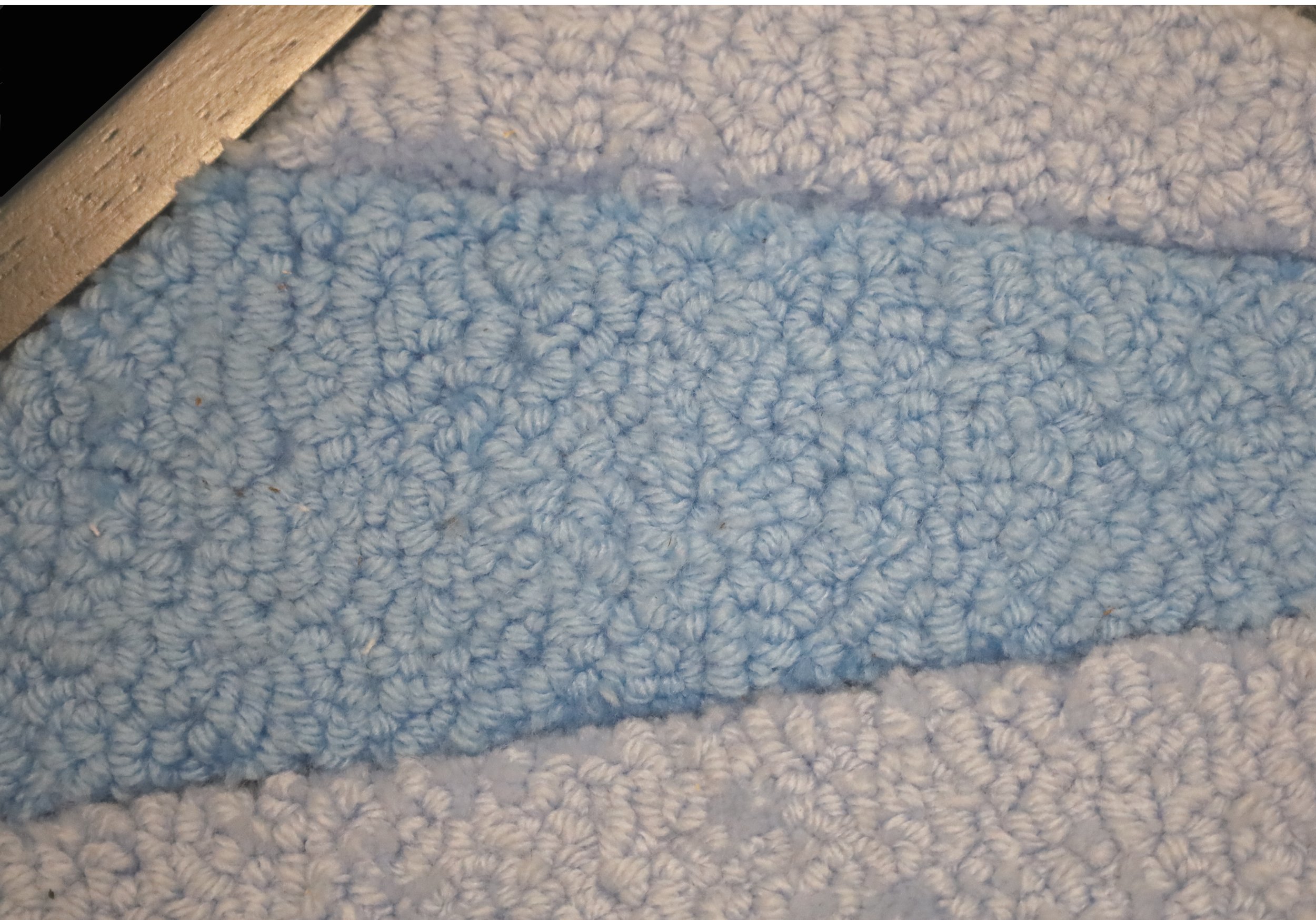 "We Are Here" 
108" x 102" x 4" 
Wood, paint, tufted yarn, basket reed, & acrylic glass (2024)