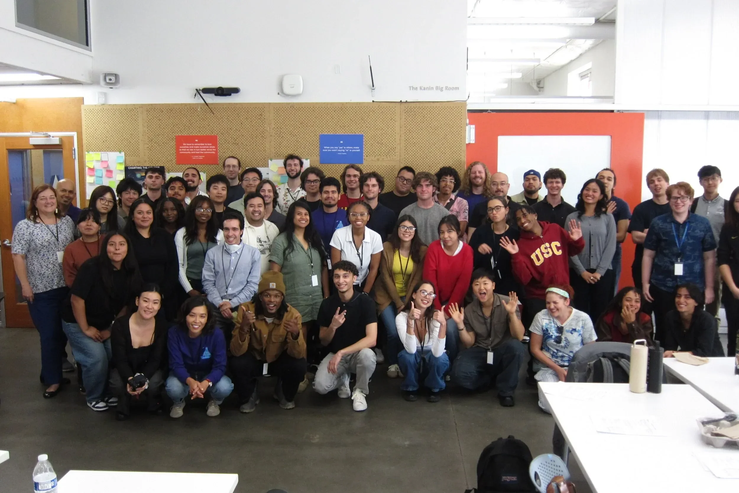 Highly educated math tutors gathering for photo during a semesterly training session