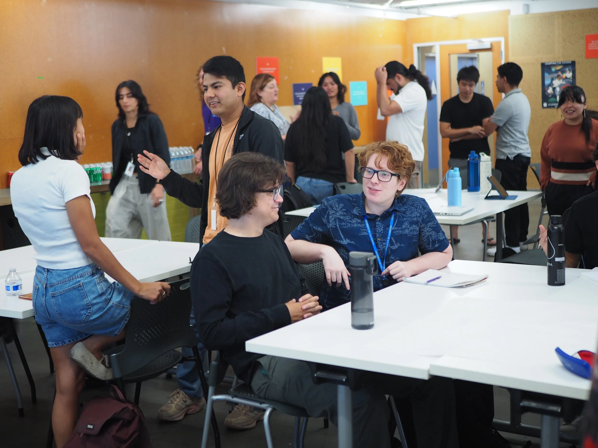 Two math tutors talking about how to improve the abilities of K-12 students in Los Angeles.