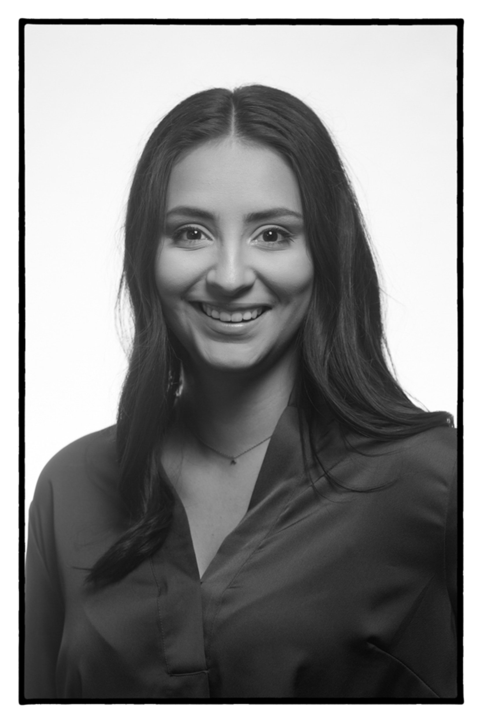 portrait of you woman in front of white background