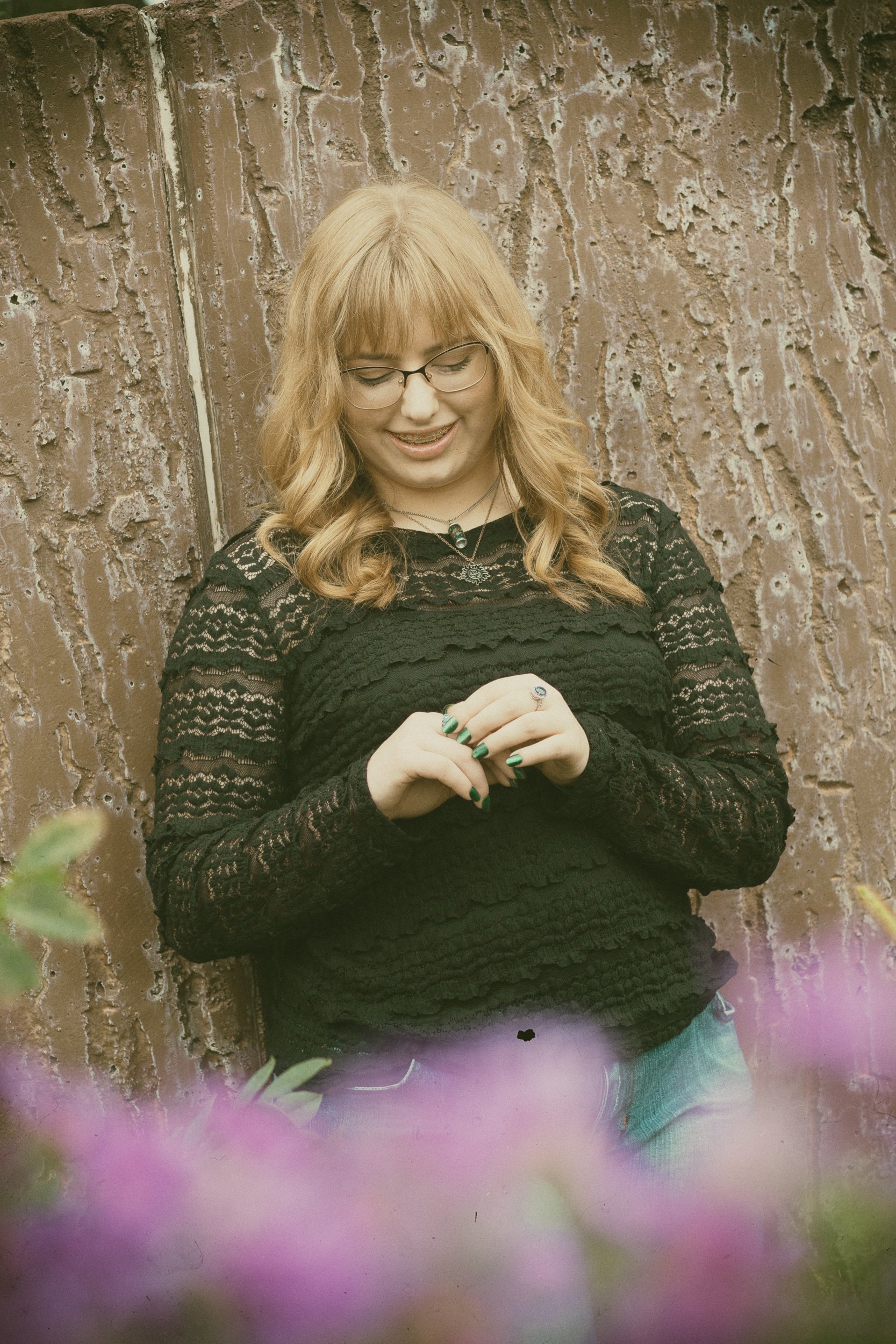 senior girl around flowers
