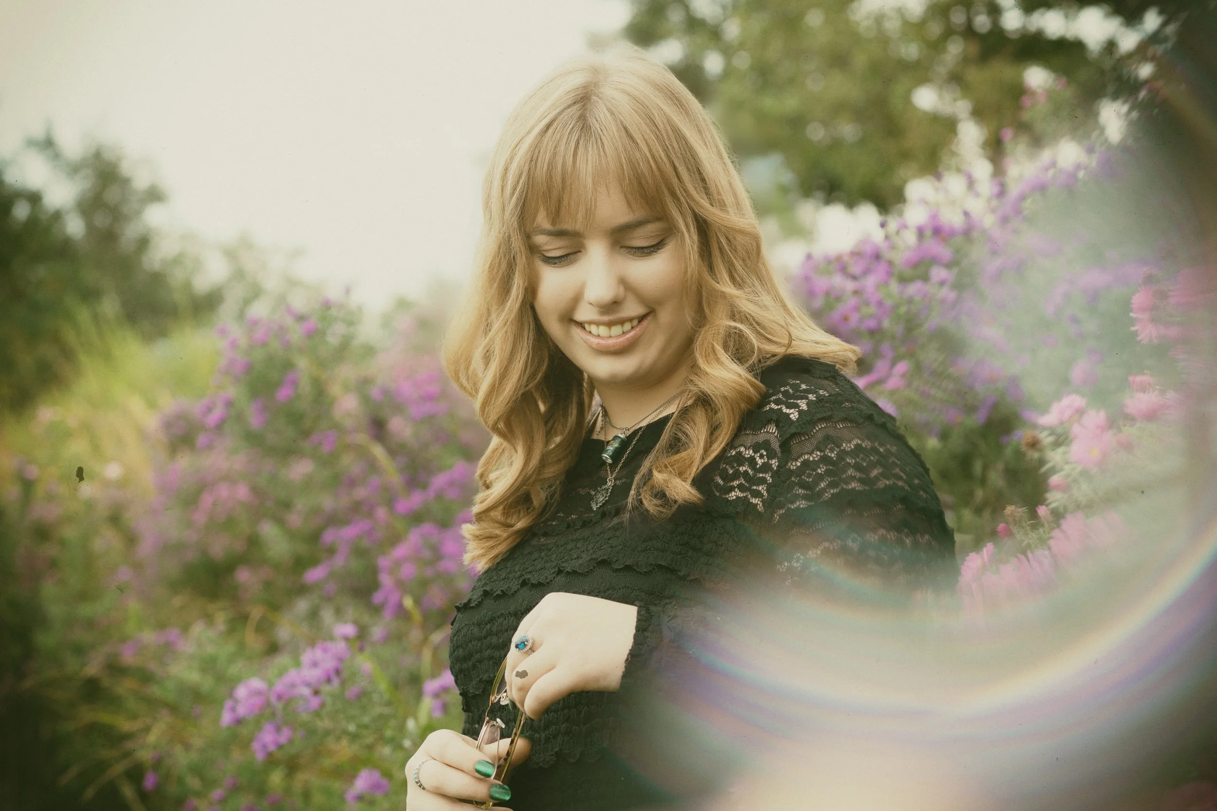 senior girl around flowers