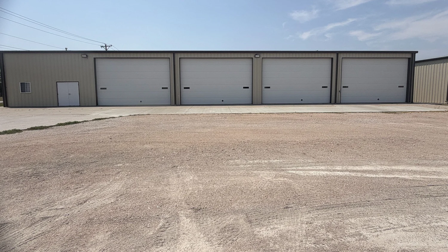 1900 W A St, four drive-in doors across the front