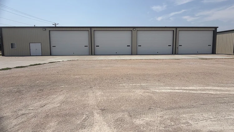 1900 W A St four-bay shop exterior