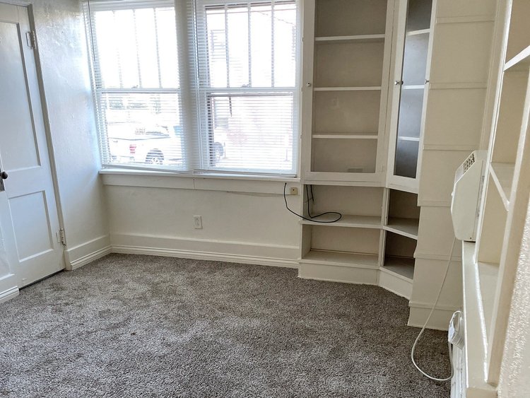 Living room with built-in shelving