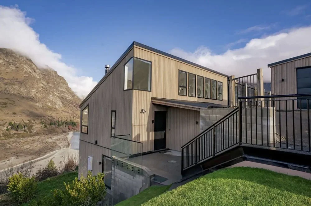 Large modern home with black detailing