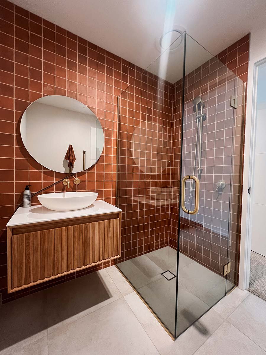 Modern bathroom with red tiles