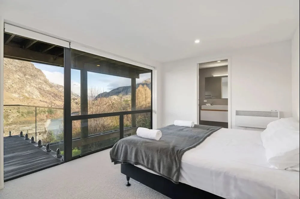 Bedroom and ensuite with a view and access to balcony