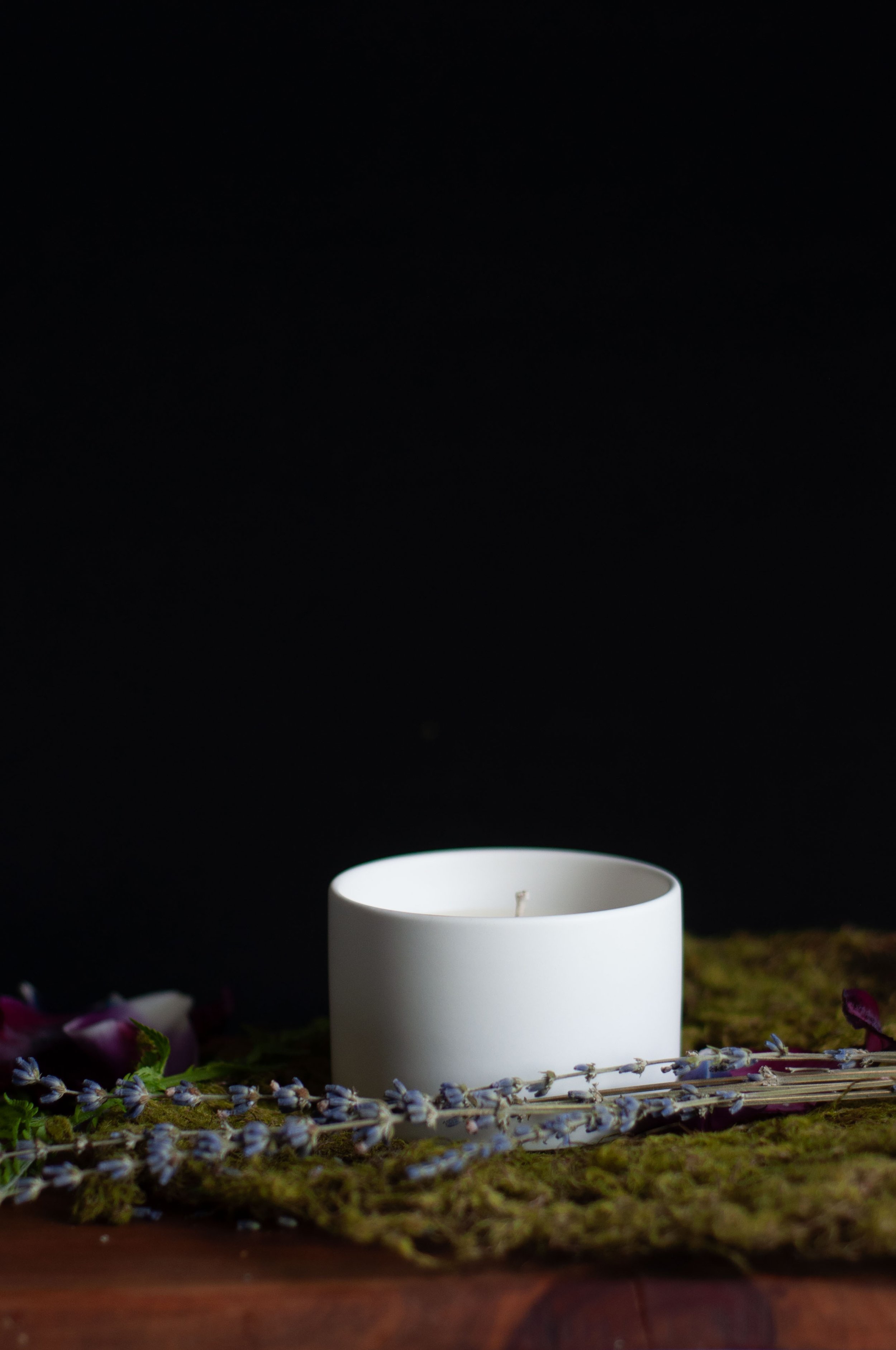 dusk candle in white vessel