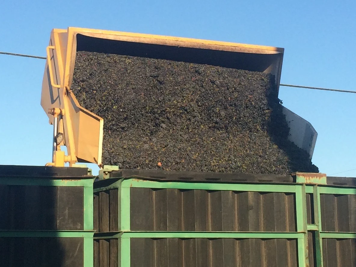 Acampo Machine Works Gondola dumping into truck