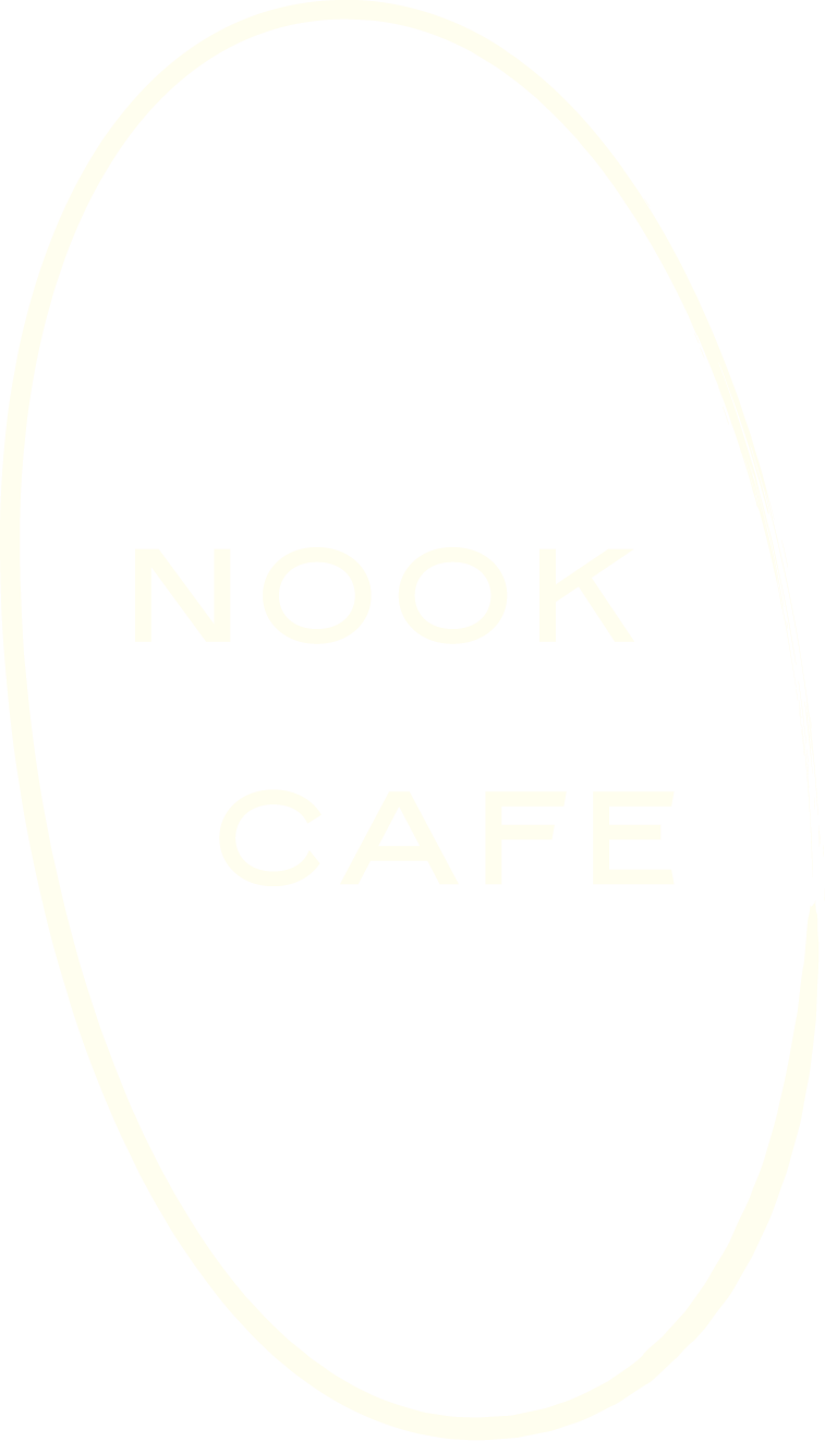 Sign with the text 'Nook Cafe' in white on a black background, surrounded by an oval white border.