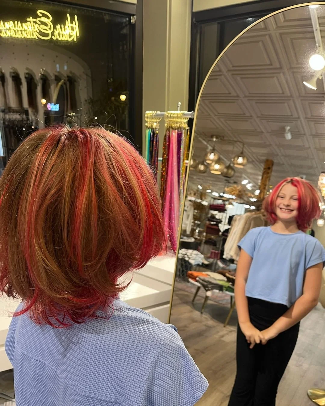 Reagan added bold cherry and strawberry ribbons with a bright face frame, keeping this bob soft and bouncy. Vivid highlights are customizable, fade gracefully, and refresh easily when you&rsquo;re ready for a new vibe.
