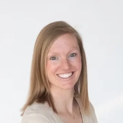Kaitlin Hartley Pelvic Floor Therapist with shoulder-length hair against white background