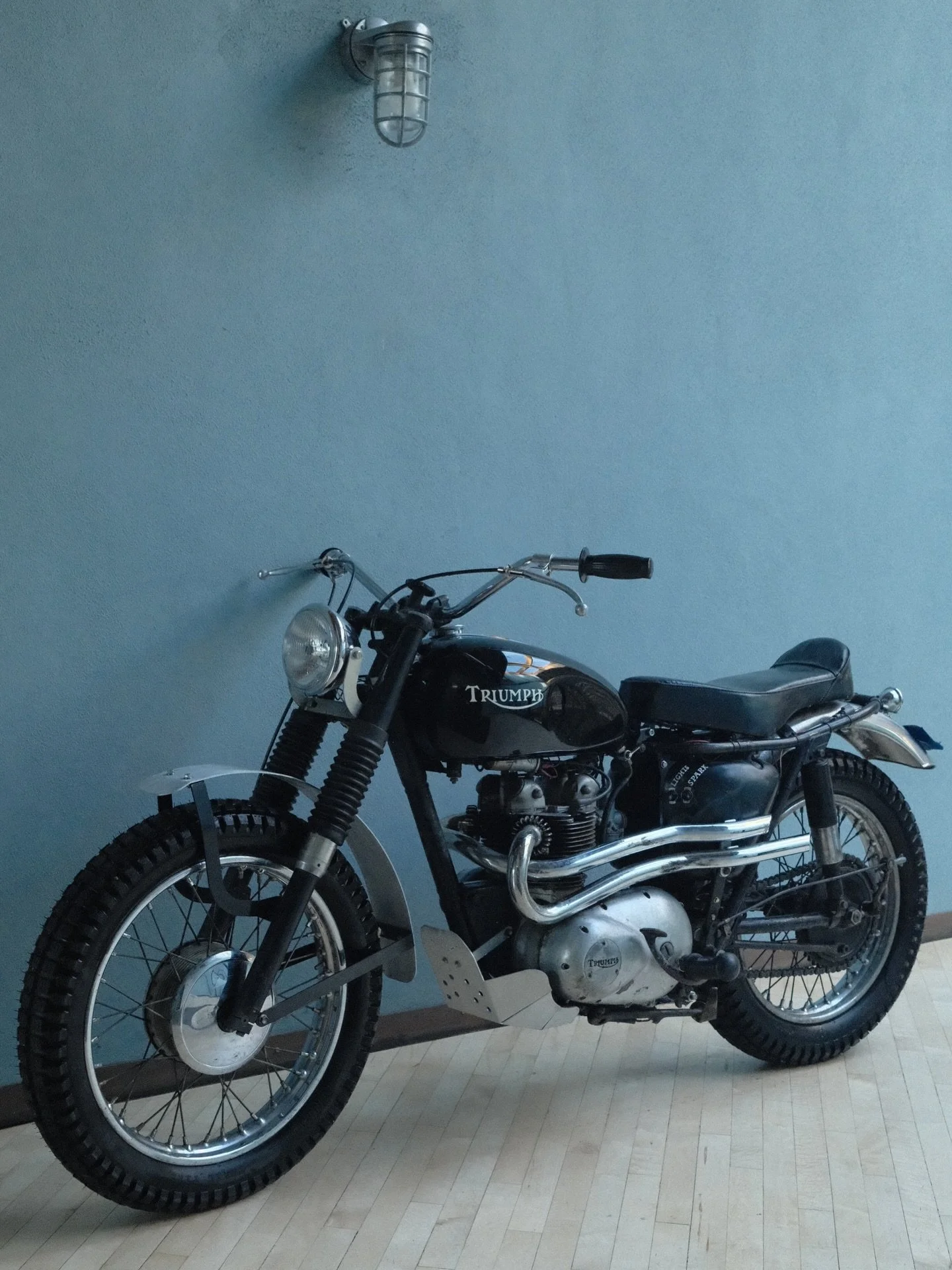 @beermanmw and @lepapillon.garage 

Our 1969 T100C black hawk desert sled is our new module for T100 desert sled builds. Custom seats/ bash plates/ light brackets and fenders, new tires, bars, pipes and lighting system, this motorcycle is street lega