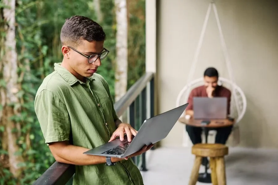 Student browsing online course options for graduate school preparation on a laptop
