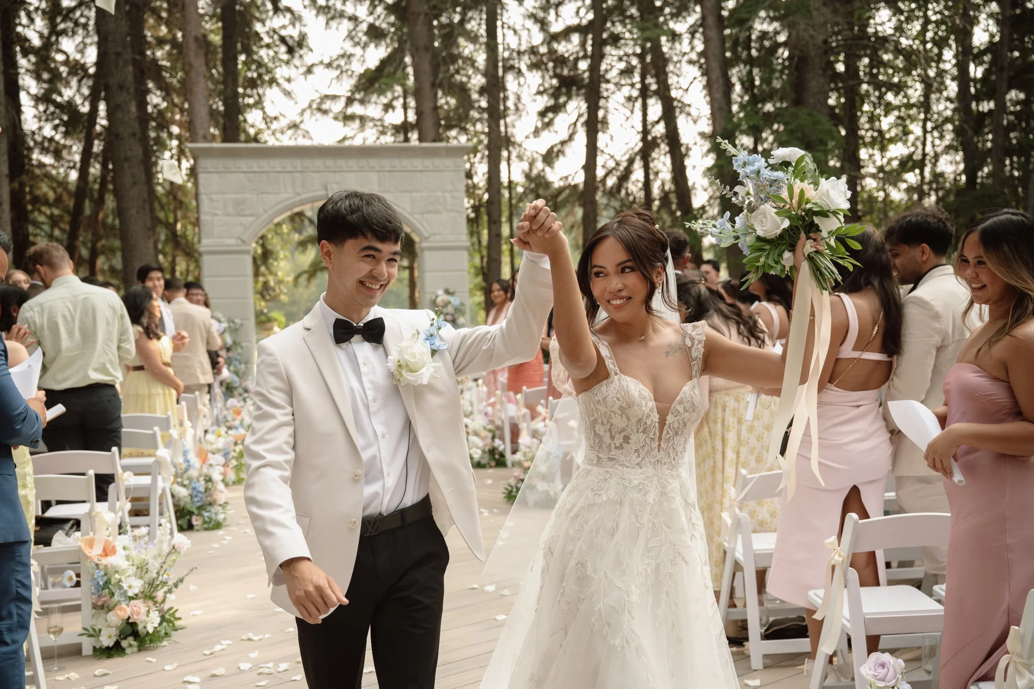 Venue: Archway Manor
Photo: Amber Ruf Photo 
Video: The Episode Films
Florals: Bloom & Borrow
DJ: Talent Productions 
Caterer: Fork & Farm 
Hair: Hair By Deena 
Makeup: Awna Artistry 
Rentals: River City Events 
Transportation: AM/PM Limo