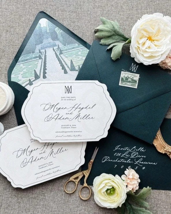 ✨ From vision to reality for Megan and Adam's French wedding celebration! Their custom save the dates feature romantic calligraphy, a dreamy garden illustration as the envelope liner, and that perfect pop of cream against deep forest green.

When you