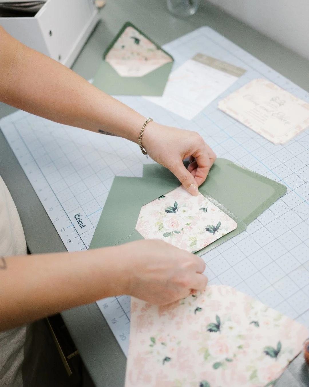 Behind the scenes: invitation assembly day 🌸

A finished suite doesn't just appear. It's built piece by piece, by hand. Liners attached and folded, envelopes sealed, every element checked before it goes out the door.

It's repetitive, meditative wor
