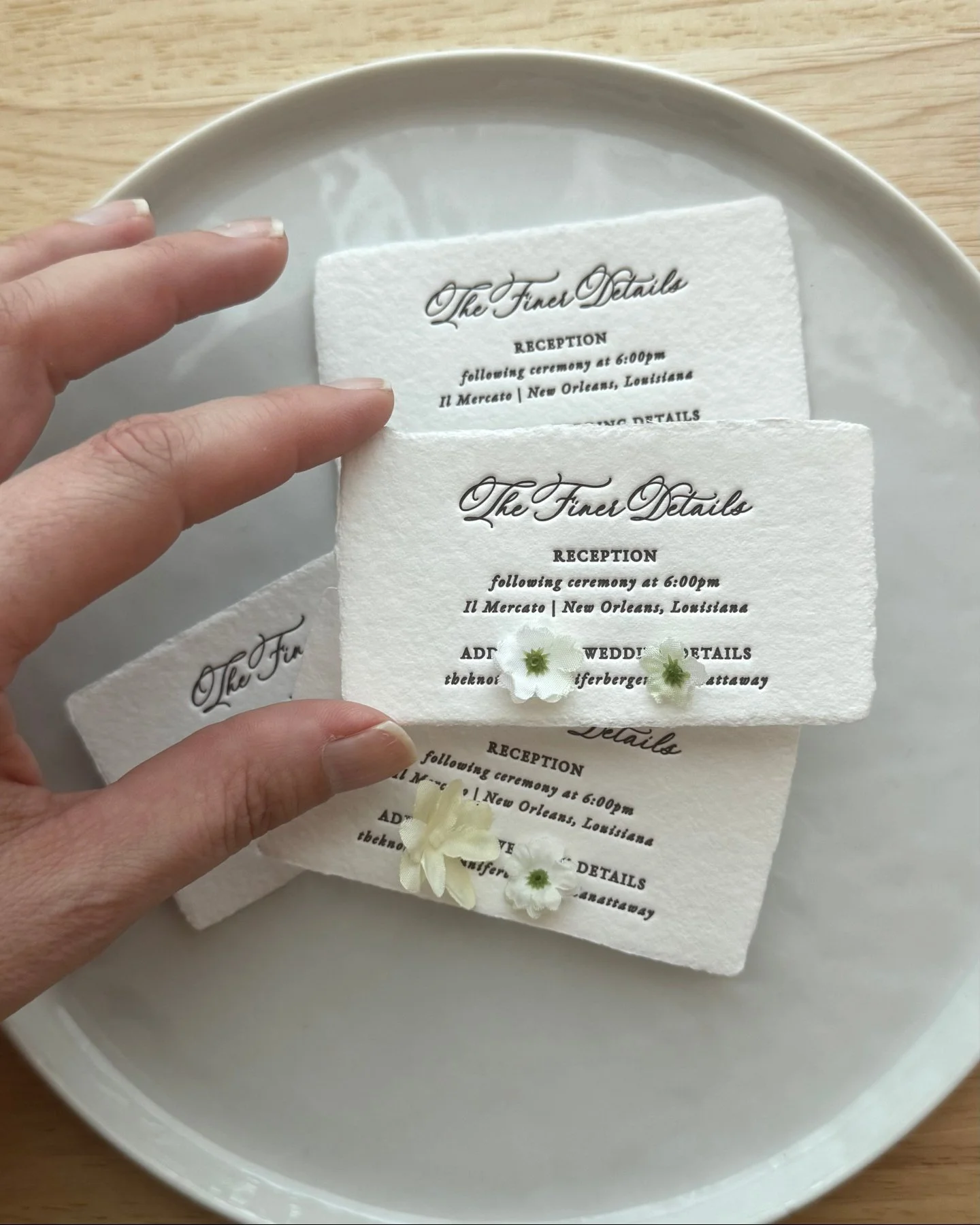 Business card sized. Deckled edges. Pressed by hand.

The details card doesn't have to be an afterthought &mdash; it can be just as considered as the invitation itself. This little card holds the logistics, yes, but it holds them beautifully.

Sneak 