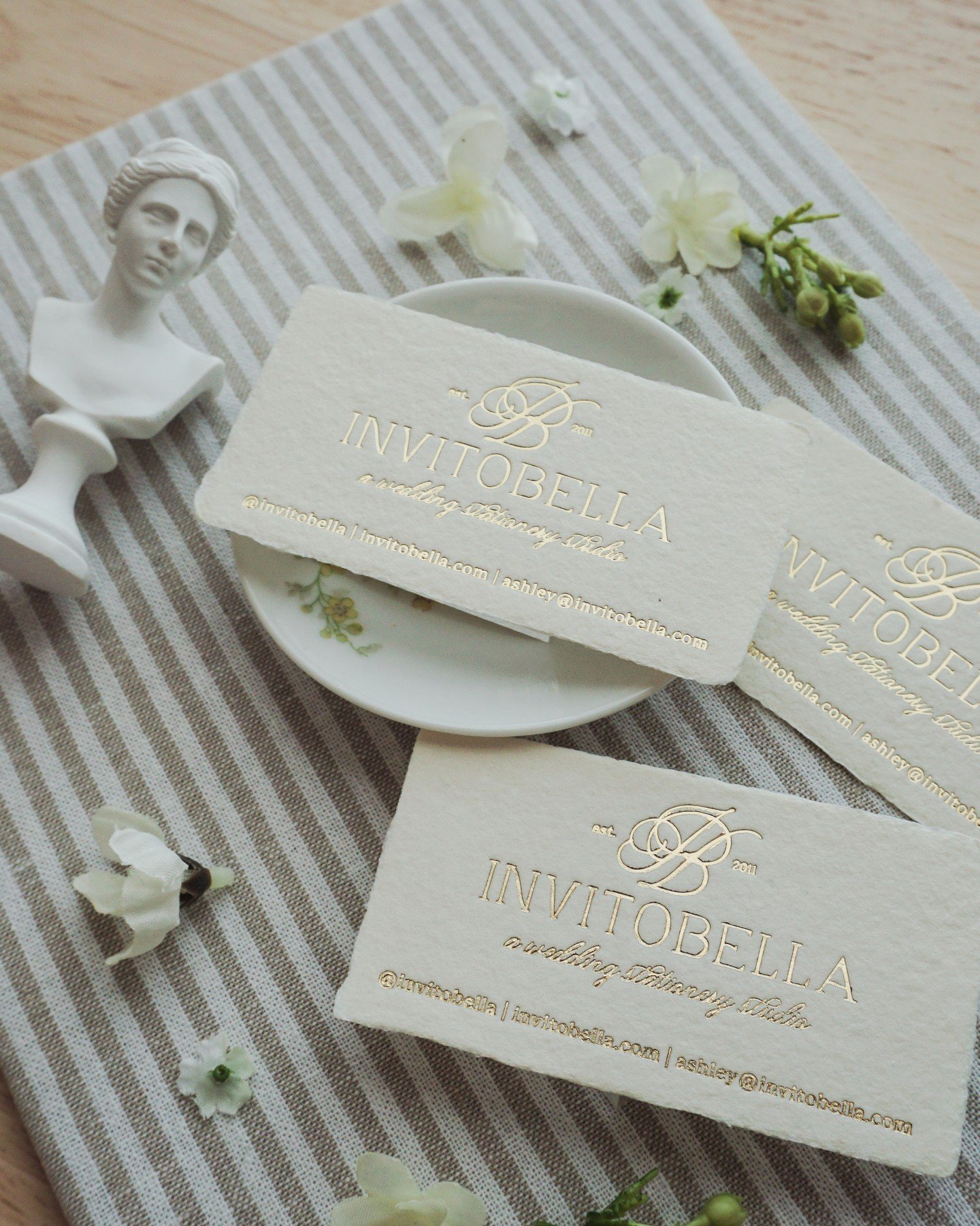 We have changed a lot since 2011.

We've acquired presses (and they have names.) The cotton paper has deckled edges. The foil is shinier. 

But the heart of this studio has never changed. InvitoBella was built on the belief that the stationery a clie