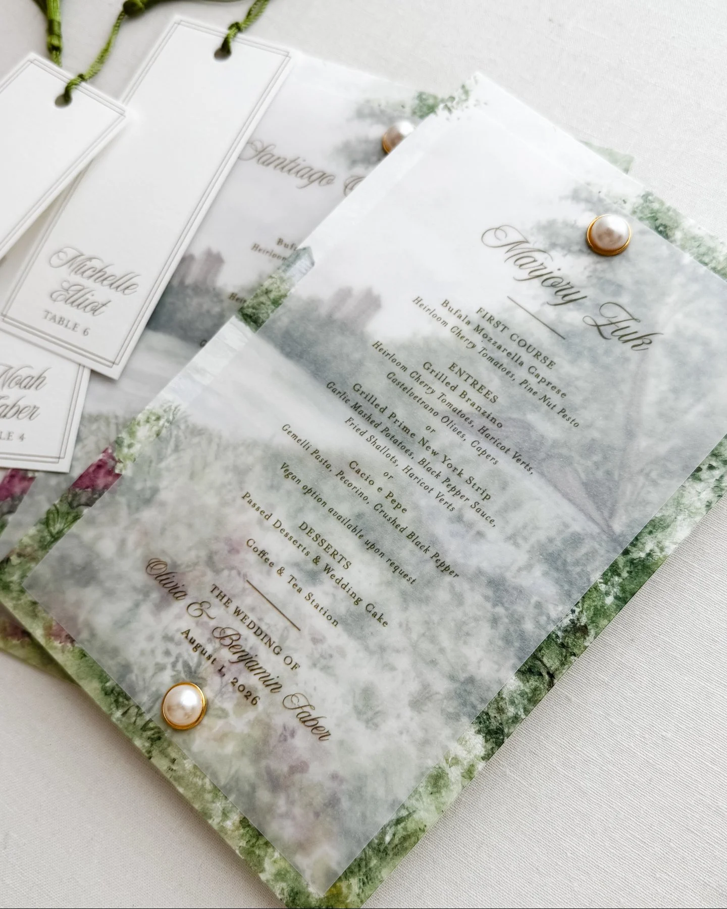 Some details you design. Others you get to help bring to life.

For Olivia and Benjamin's upcoming day, we layered the dinner menu over the bride's own watercolor artwork, a piece she painted herself, printed as the base of each place setting. Her pa