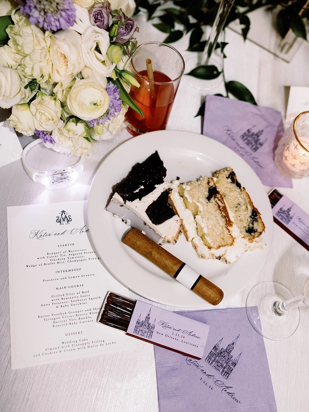 The end of the night tells its own story.

Cake slices, a cigar, and our paper goods scattered across the linen, each one carrying the St. Louis Cathedral illustration.

We love a pristine flat lay as much as anyone, but there's something honest abou