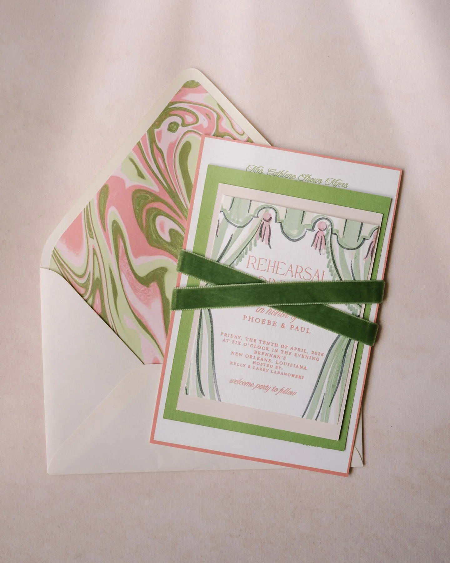 Some details you plan. Others you feel.

Phoebe and Paul's full Heirloom suite is a study in layers. Hand-painted drapery, marbled envelope liners, and stacked cards in coral and moss. But the finishing touch that ties it all together, quite literall
