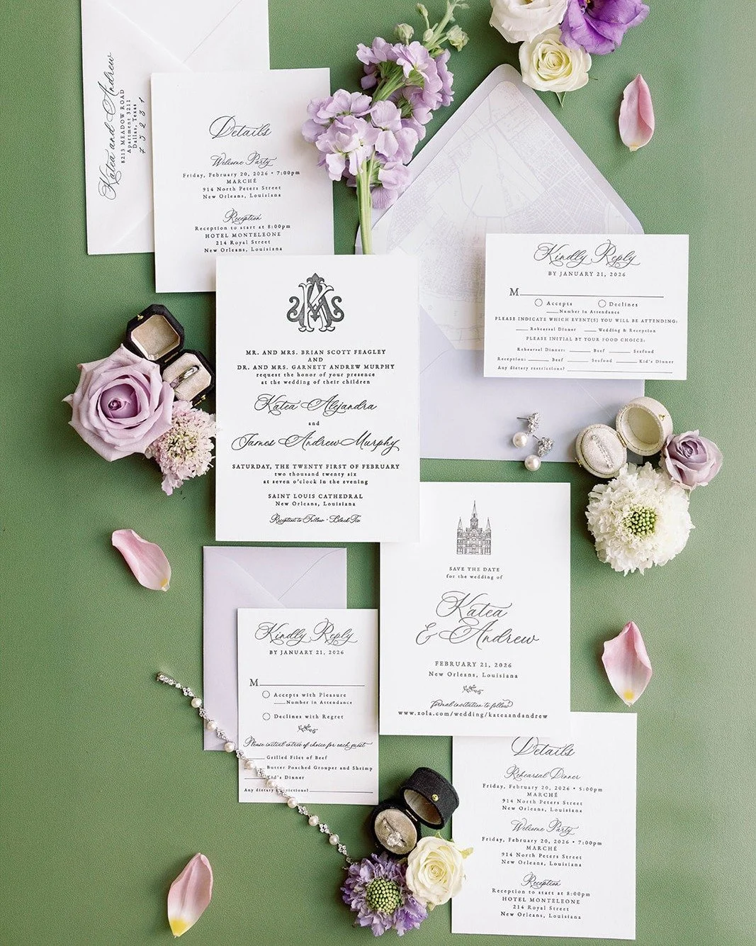 Black ink on cotton paper, a lilac envelope, and a vintage monogram with all the old New Orleans nostalgia in it.

Katea and Andrew were married at Saint Louis Cathedral, so we had to incorporate our illustration, the spires and all, in a line so fin
