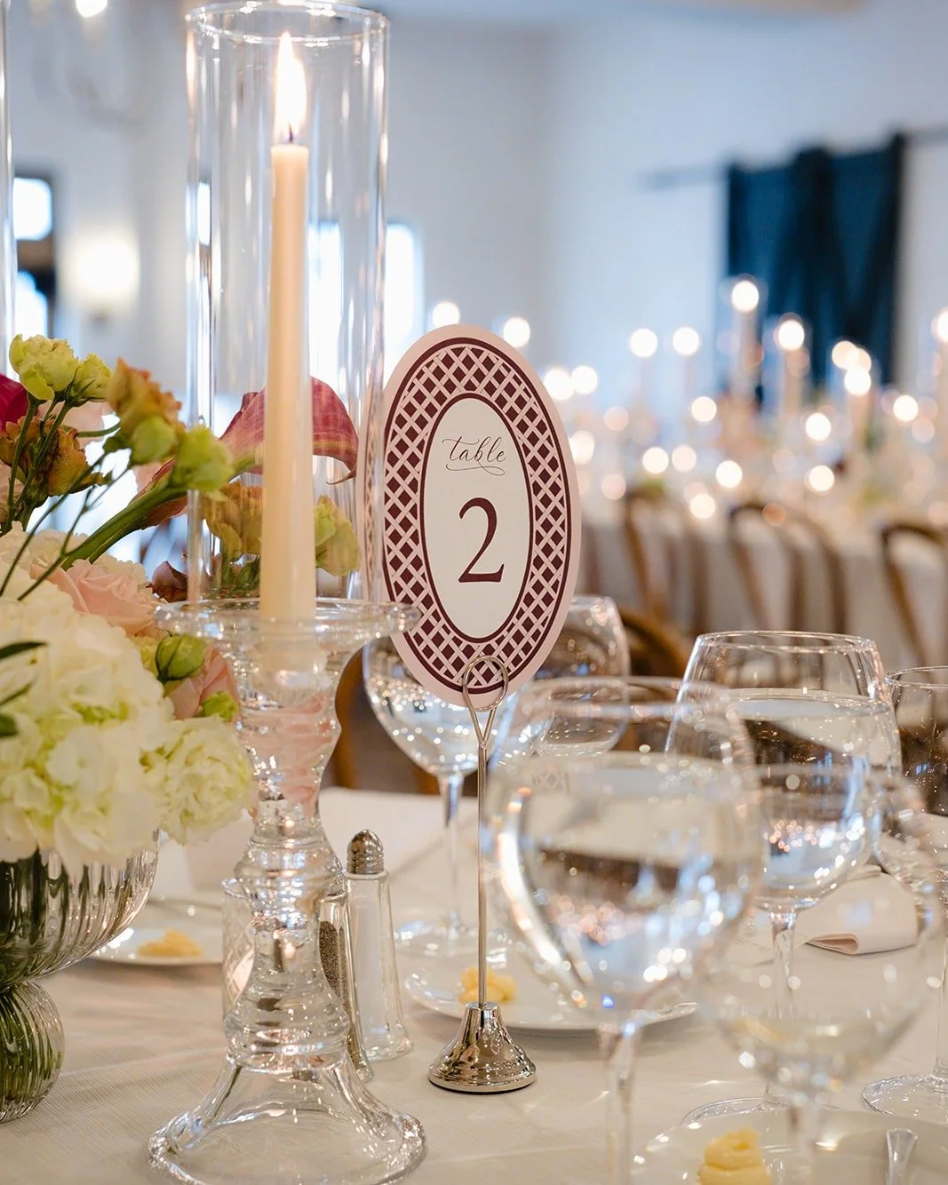 A little lattice, a lot of romance. ✨

Jennifer &amp; Ian&rsquo;s table numbers took on a classic oval shape framed in a deep wine trellis pattern, a nod to timeless garden elegance with just the right amount of New Orleans charm. Paired with flicker