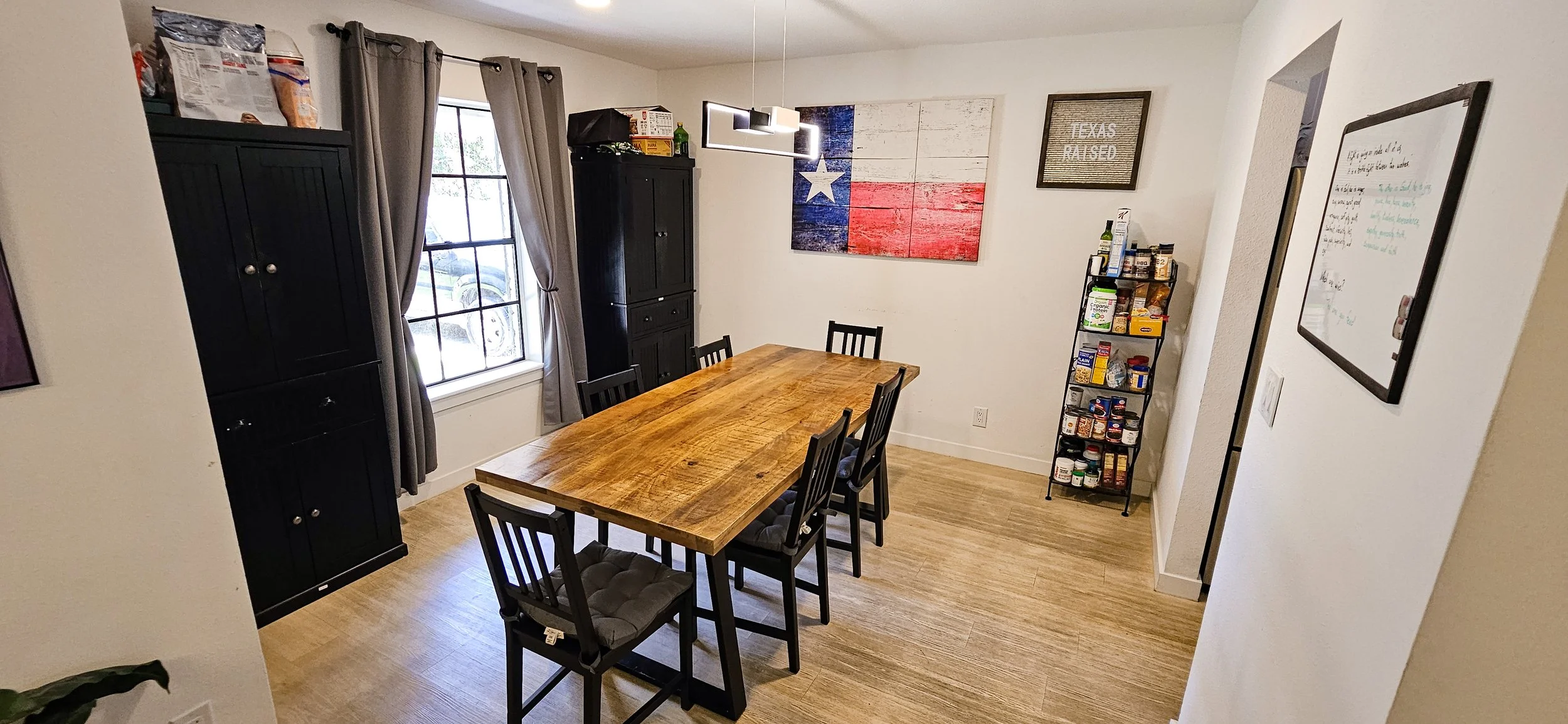House 1 dining room with ample storage