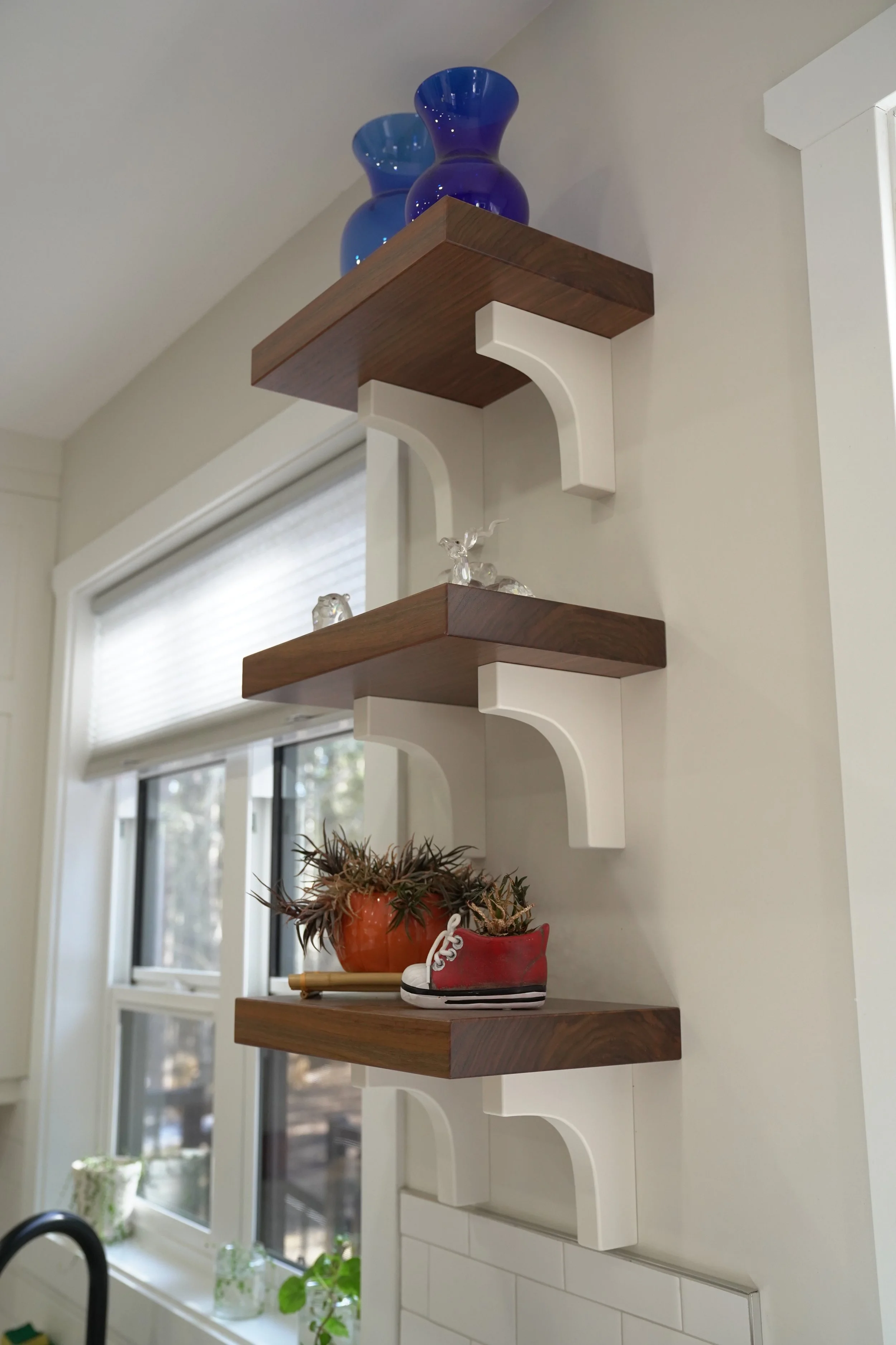 Custom kitchen open shelving with integrated storage and display space