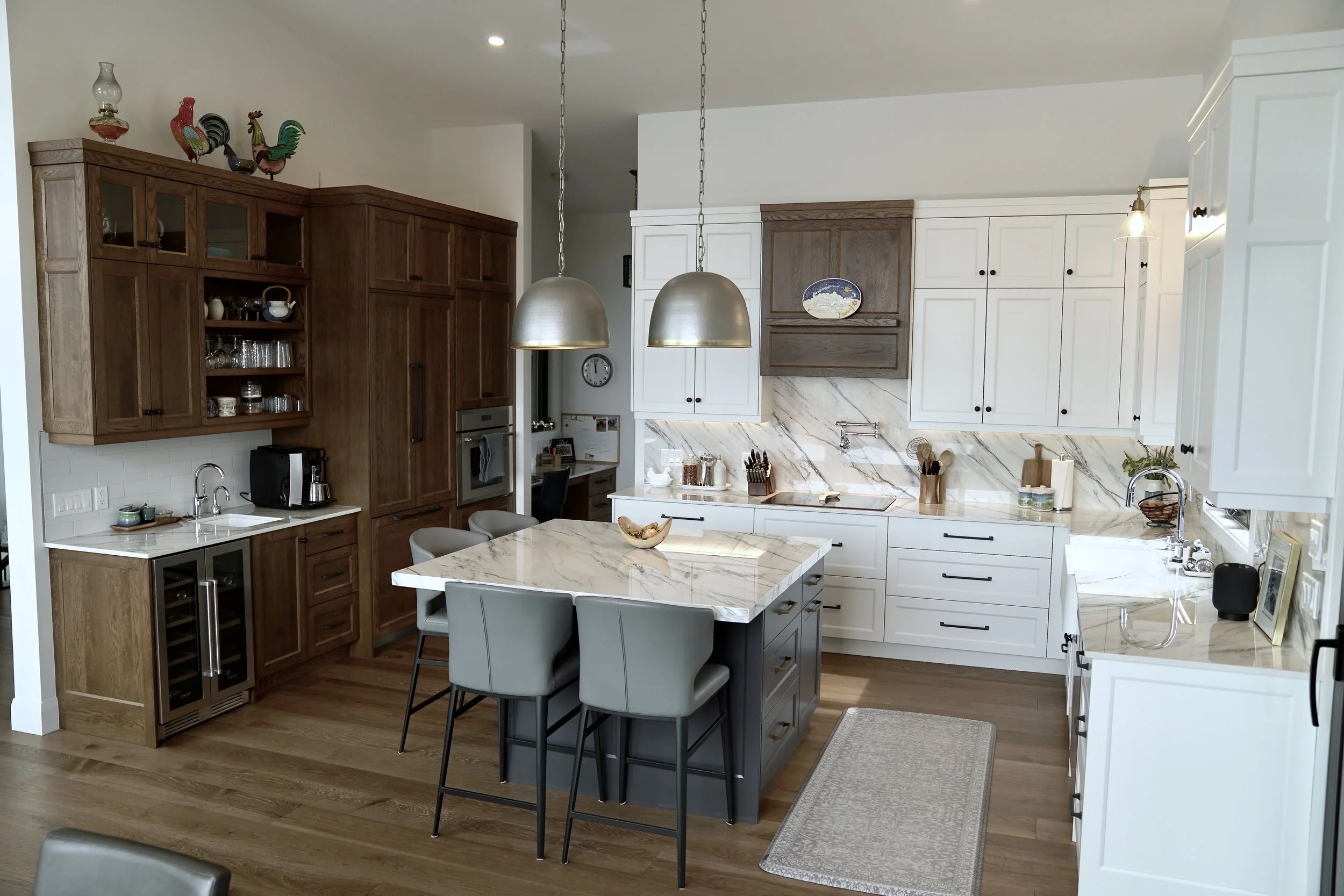Custom oak kitchen cabinetry with large island and built-in storage